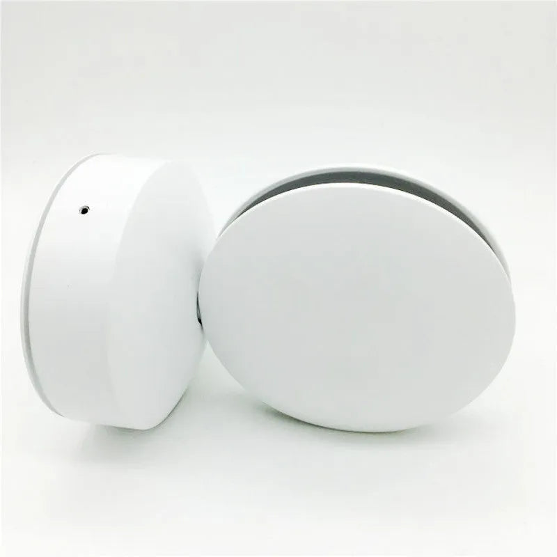 Modern aluminium and glass LED spotlight bar wall lamp mounted on a wall.
