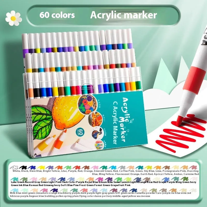 Box of multicoloured acrylic marker pens for student painting, showing plastic pen casings.
