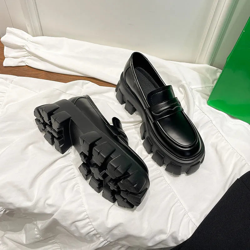 British style wide fit loafers in patent leather with a rubber sole