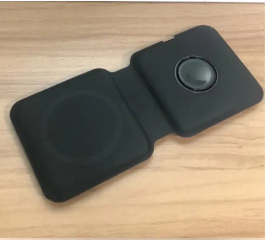 White foldable magnetic wireless charging dock showing dual charging surfaces and compact folded design
