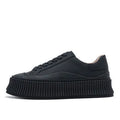 Women's suede platform sneakers with thick rubber soles and cross binding detail in black, white and white-black colour options