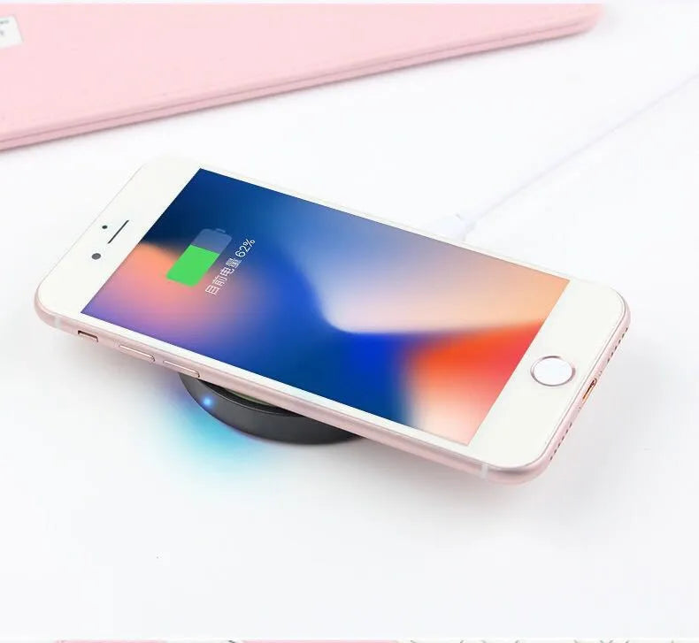 Square Qi wireless charging pad in one of six colours: black, blue, orange, red, white, or yellow.