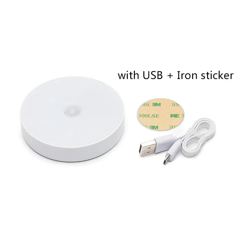 USB rechargeable motion sensor LED night light in beige or white with 86mm diameter compact design