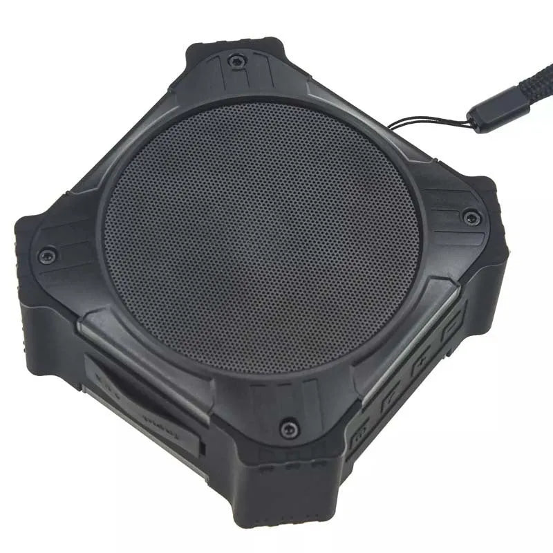 Black or blue waterproof portable Bluetooth speaker with wrist strap, shown next to charging cable.