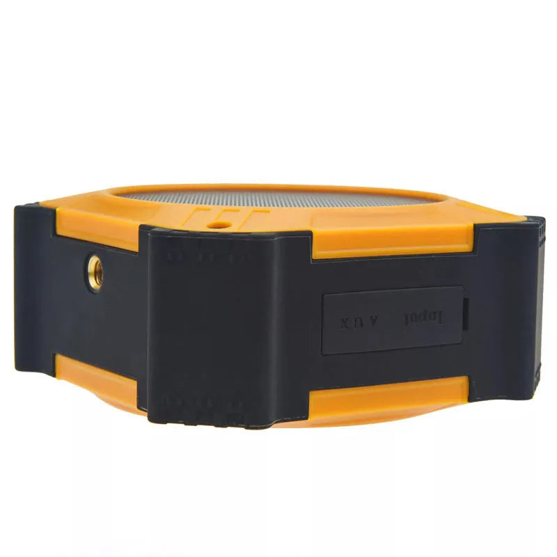 Black or blue waterproof portable Bluetooth speaker with wrist strap, shown next to charging cable.