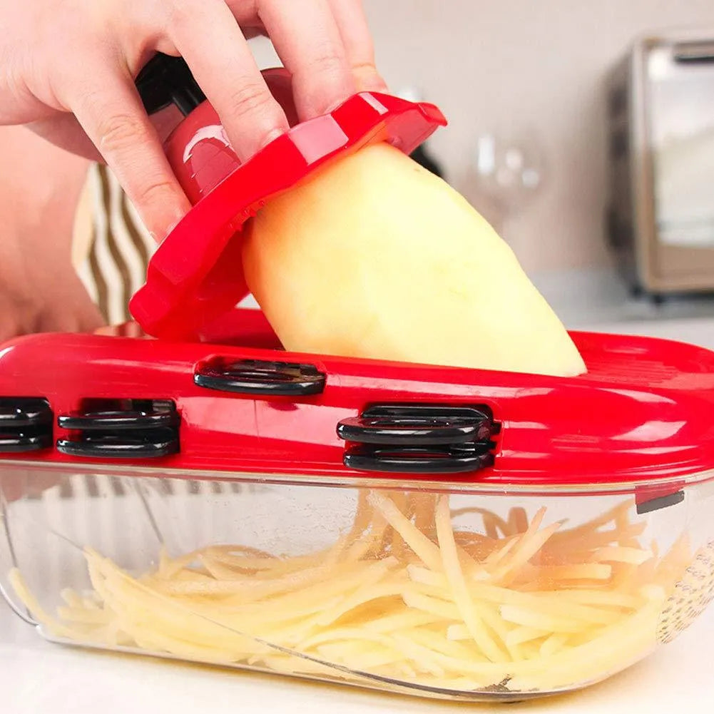Red multi-function vegetable cutter with stainless steel blades, PET container, and hand guard.