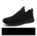 Men's black and white mesh casual sneakers with PVC soles for jogging and outdoor wear
