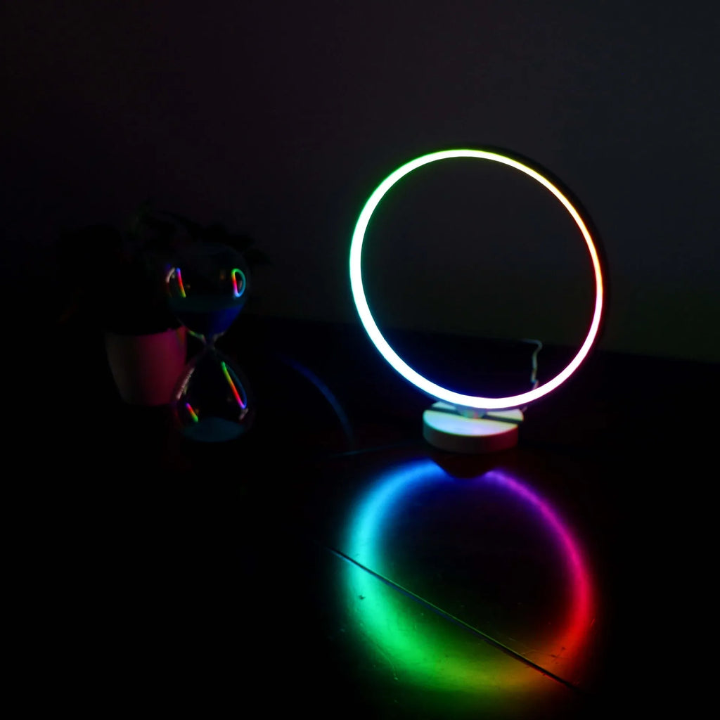 White Full Moon Lamp table lamp with remote control on wooden surface