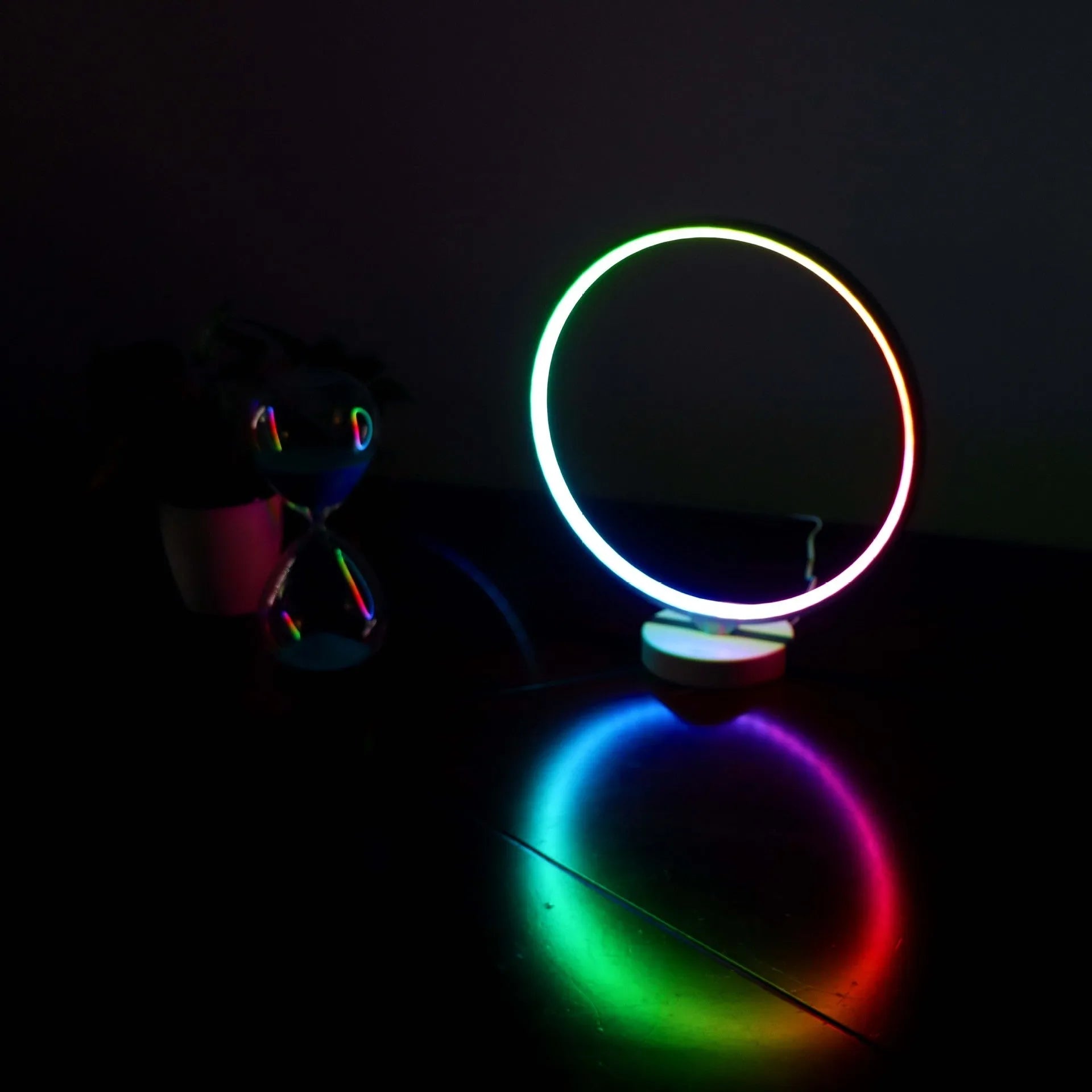 White Full Moon Lamp table lamp with remote control on wooden surface