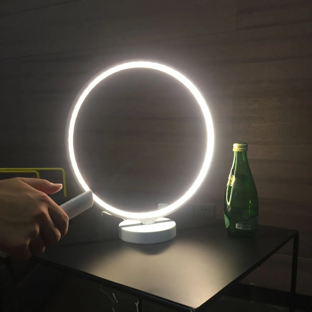 White Full Moon Lamp table lamp with remote control on wooden surface