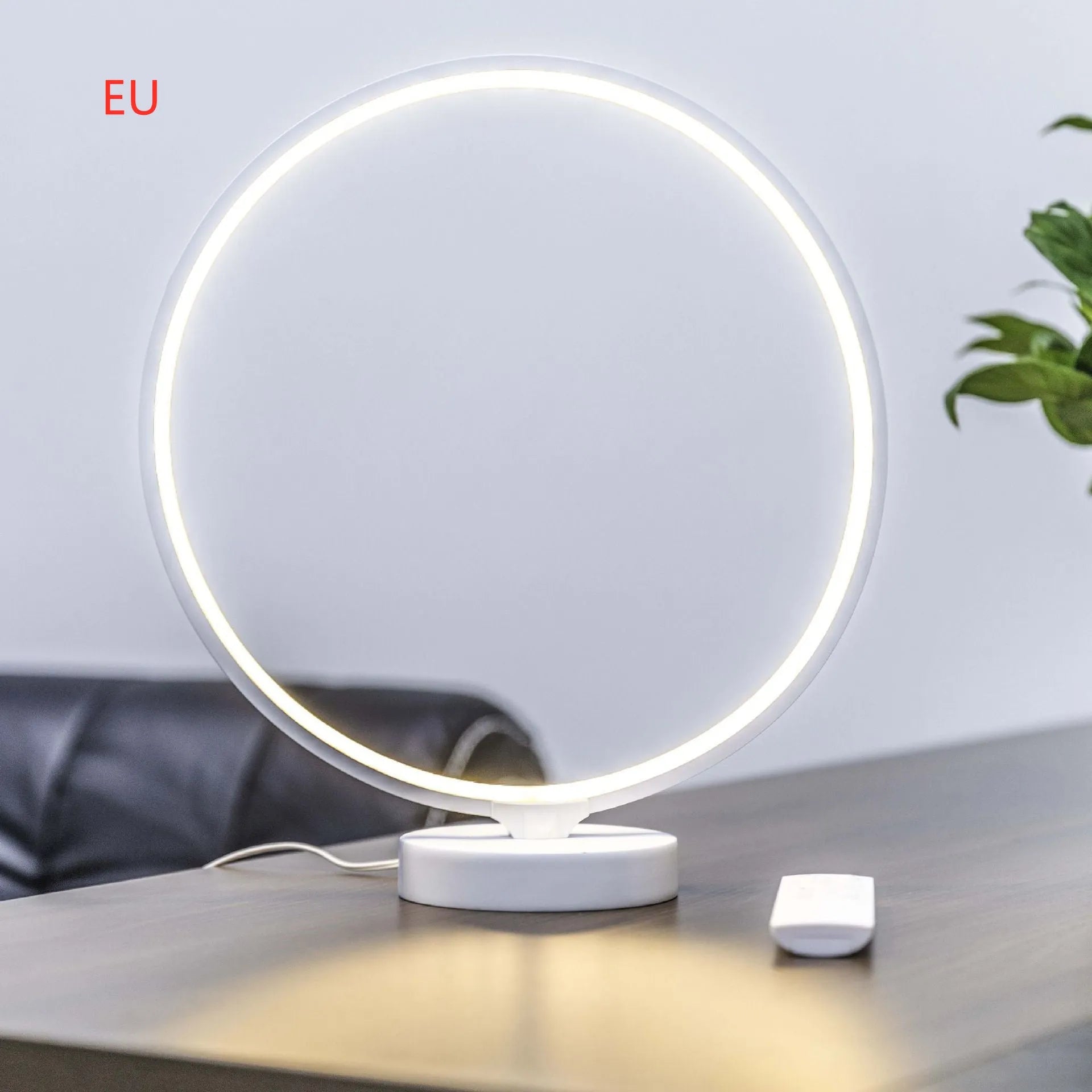 White Full Moon Lamp table lamp with remote control on wooden surface
