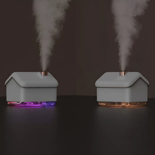 White igloo-shaped humidifier and essential oil diffuser with LED light and USB cable