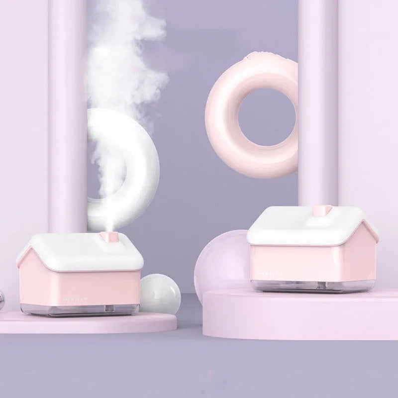 White igloo-shaped humidifier and essential oil diffuser with LED light and USB cable