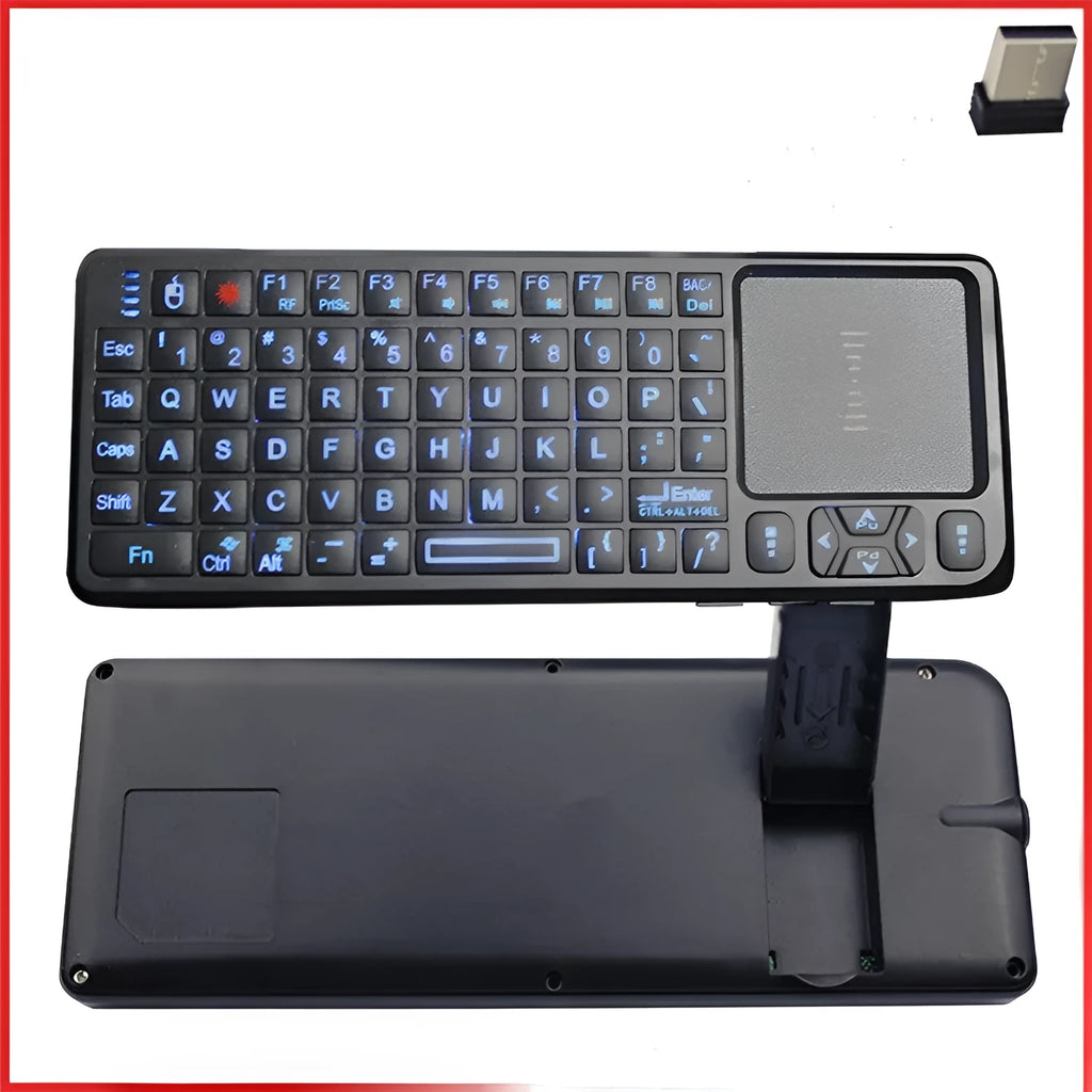 Black wireless mini keyboard with touch screen and matching optical mouse on a desk
