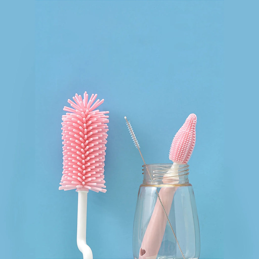 Silicone baby bottle cleaning brush set in pink, blue, and yellow colours for washing bottles and scrubbing straws.