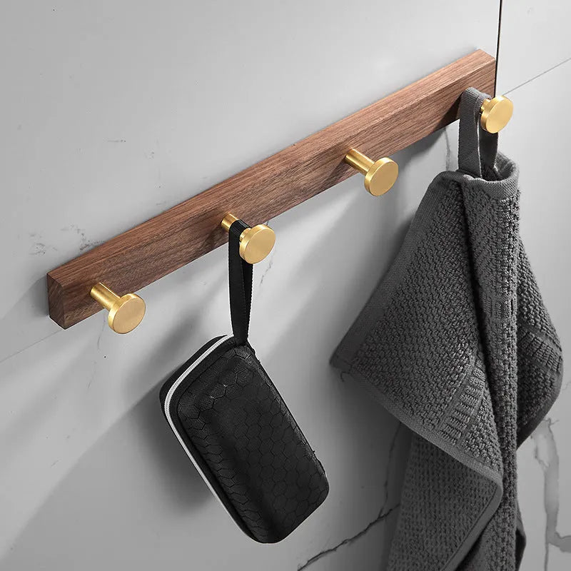 Black walnut bathroom wall hooks with brass aluminium hooks in perforated row design