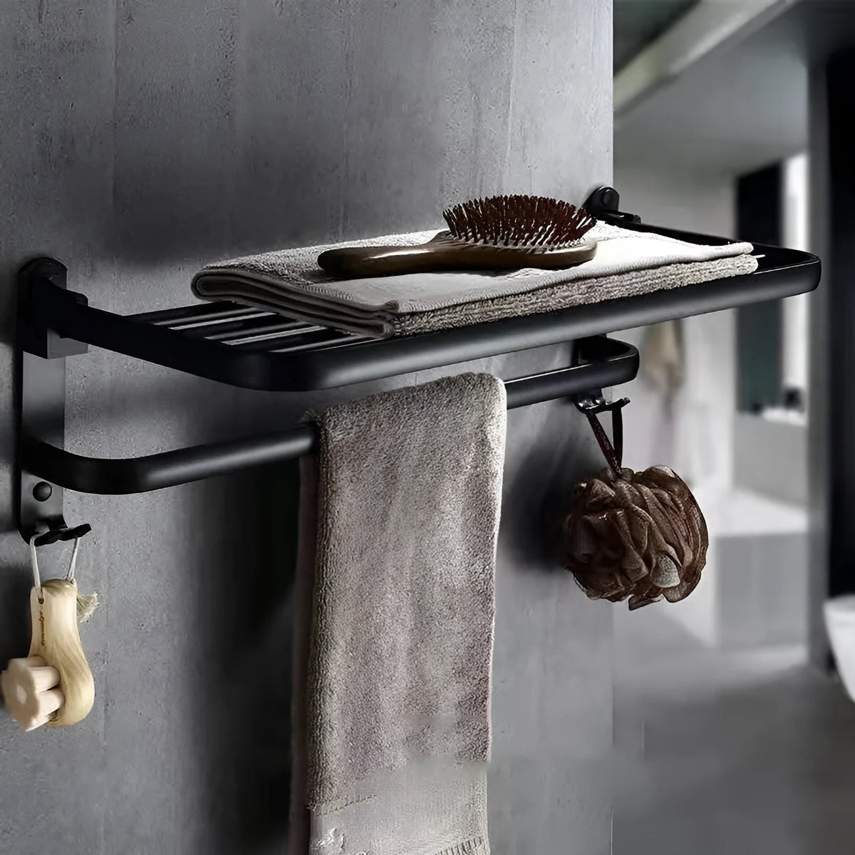 Aluminium two-tier bathroom folding shelf on a white wall, showing optional hooks and perforated surface design.