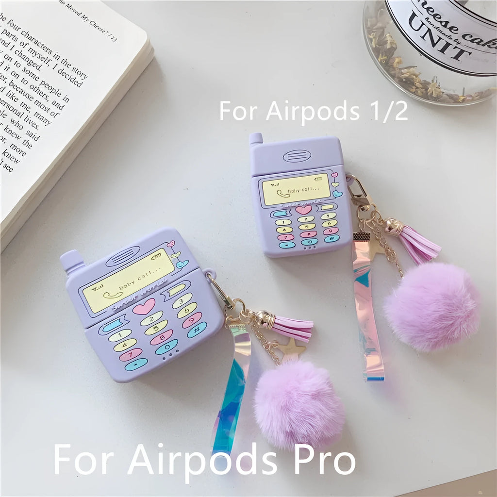 Purple silicone clamshell case for Apple-compatible wireless earphones with fur ball pendant