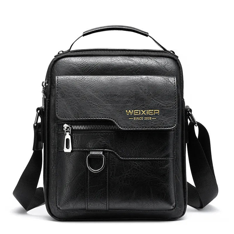 Vintage PU leather vertical business bag with soft handle, zip opening, laptop pocket, 22cm x 8cm x 26cm.