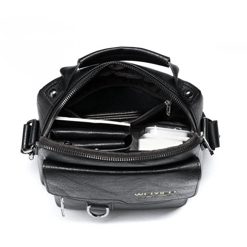 Vintage PU leather vertical business bag with soft handle, zip opening, laptop pocket, 22cm x 8cm x 26cm.