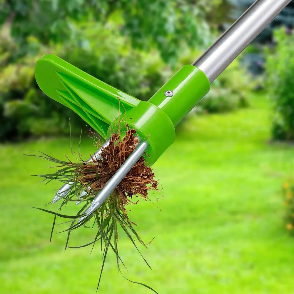 Creative manual weeding tool with aluminium handle and plastic head on garden soil.