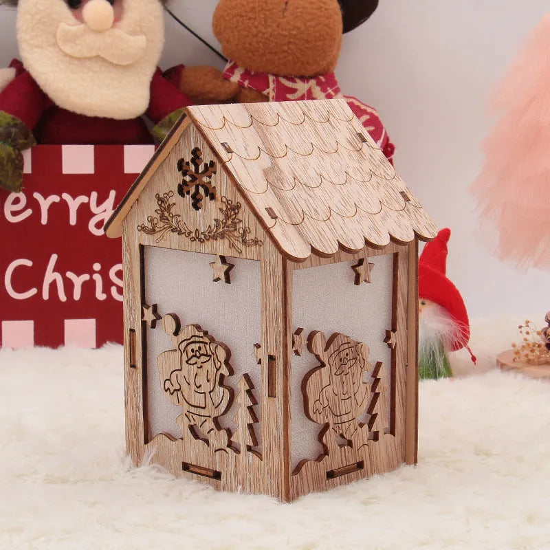 Three handmade wooden house Christmas decorations in natural wood finish with rustic Scandinavian design