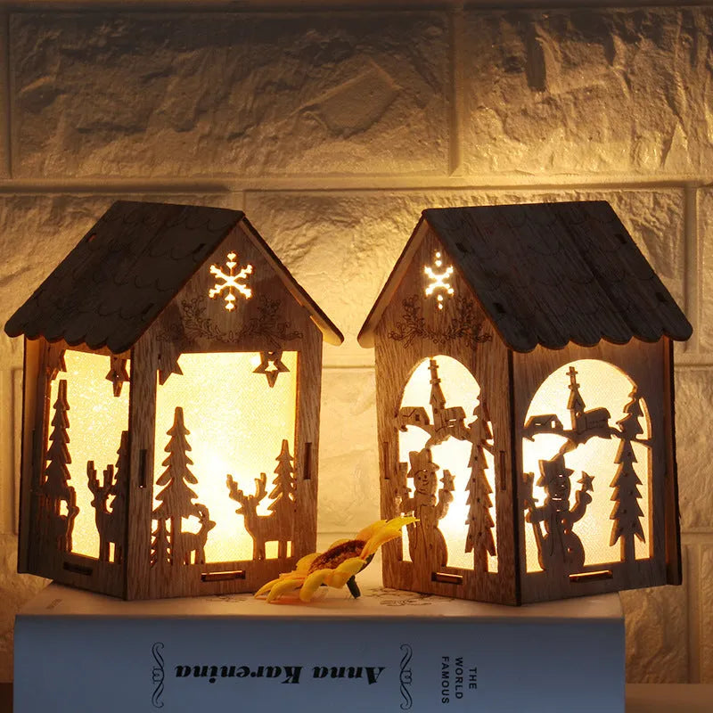 Three handmade wooden house Christmas decorations in natural wood finish with rustic Scandinavian design