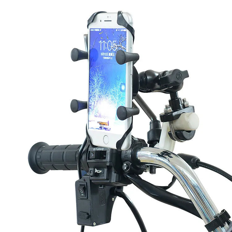 Black aluminium alloy motorcycle phone bracket mounted on a bike handlebar, holding a mobile phone.