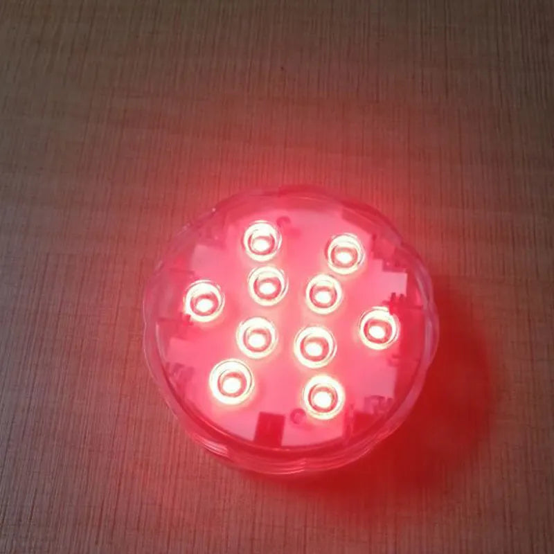 White waterproof disc LED light with remote control for swimming pools and garden decoration