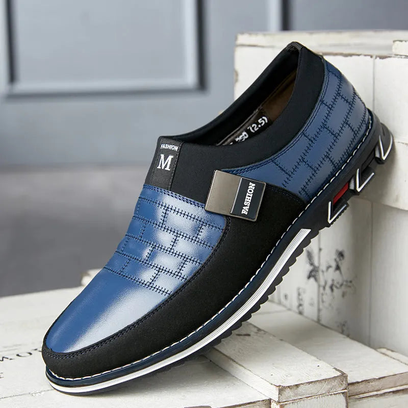 Men's large size blue casual leather shoes with low-cut design on a white background.