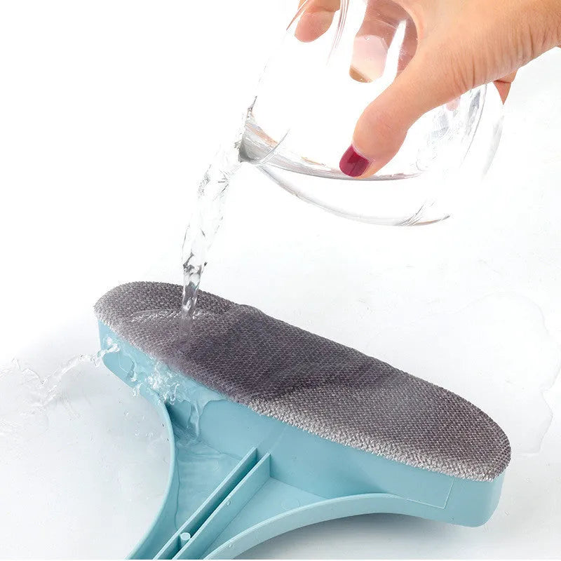 Pink adjustable telescopic window cleaning brush with a sassafras head and a crevice brush attachment on a white background