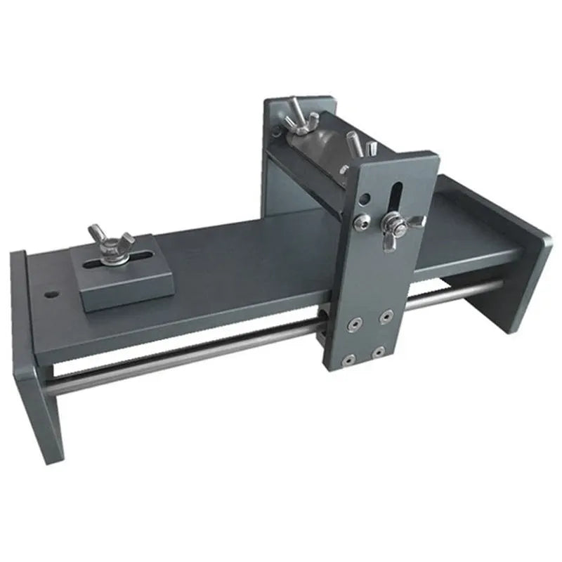 Aluminium alloy gantry fixed angle sharpening tool for woodworking chisels and planers on a workbench.