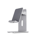 Alloy desktop mobile phone holder bracket in dark space grey colour on wooden desk