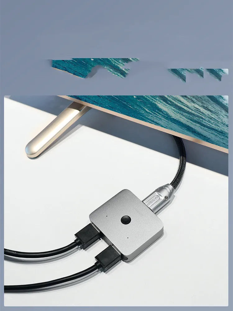 Grey Haibeisi HDMI one input two output splitter switcher device for 4K monitors and TVs.
