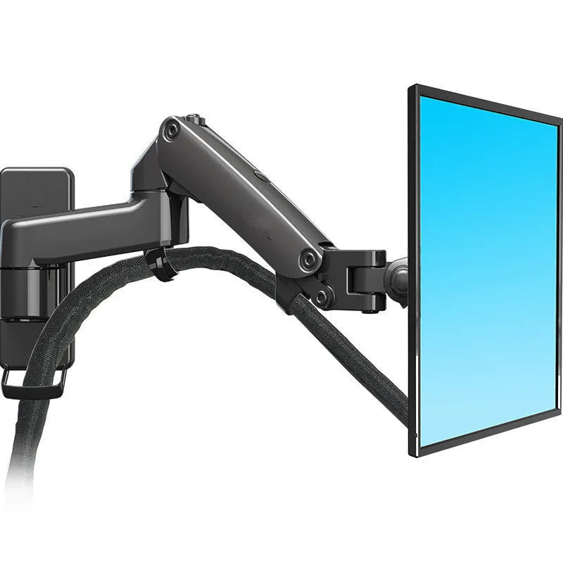 Black wall-mounted adjustable monitor stand extended from the wall, showing VESA plate.