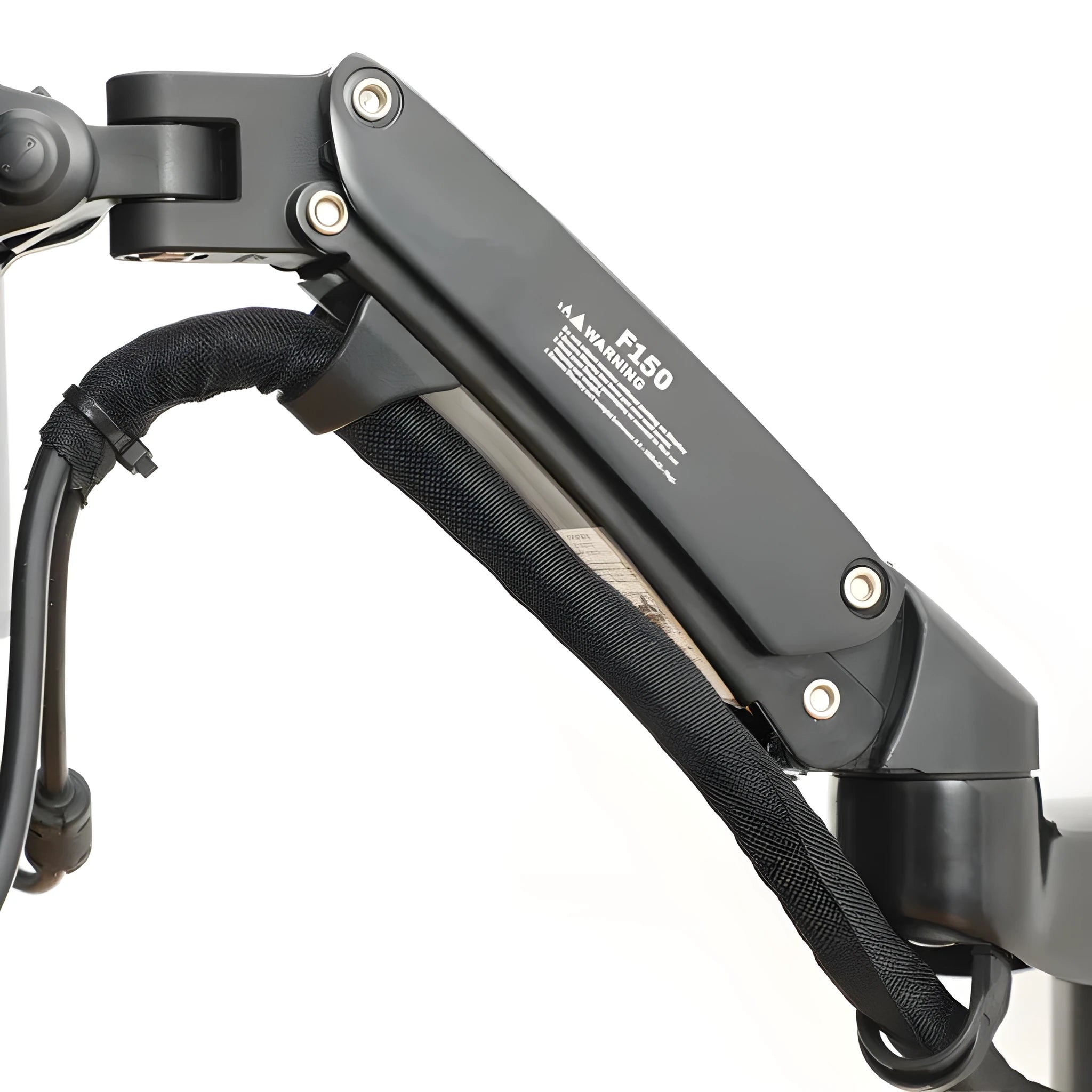 Black wall-mounted adjustable monitor stand extended from the wall, showing VESA plate.