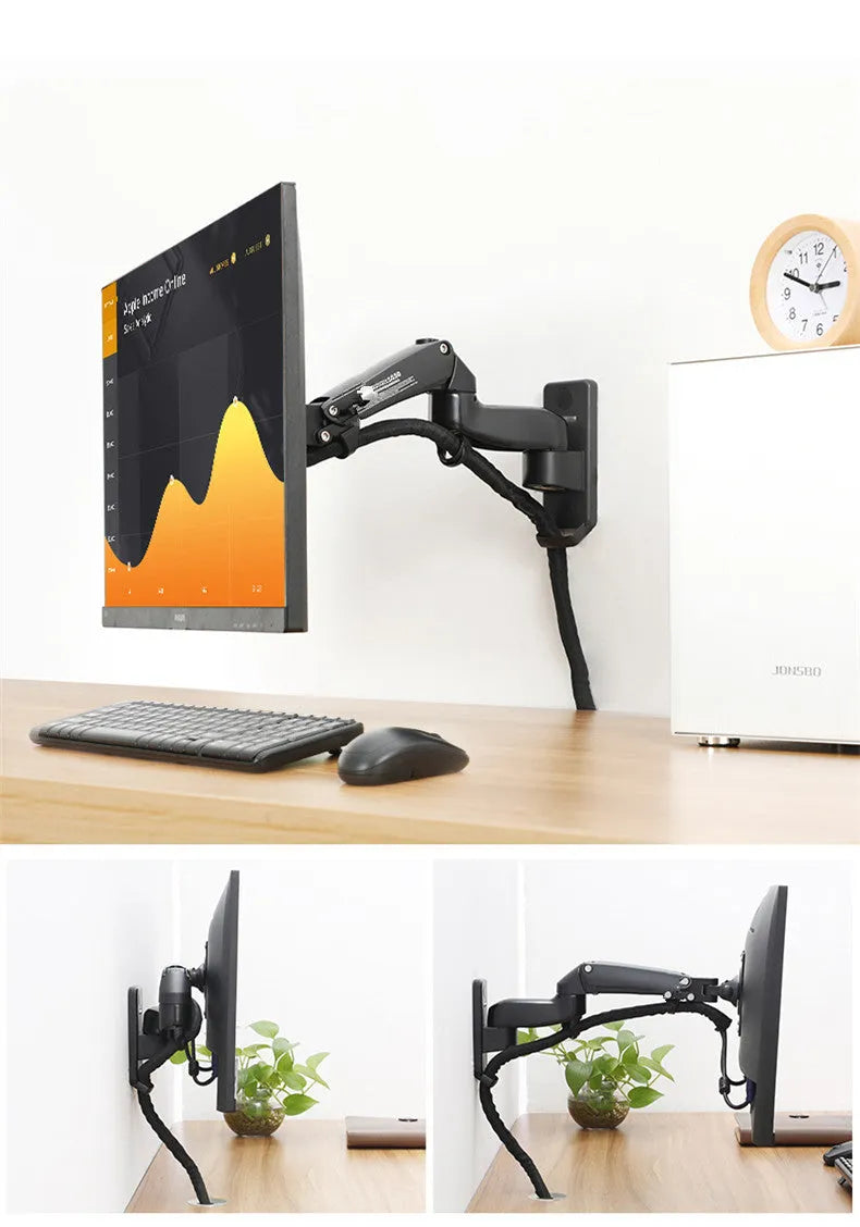 Black wall-mounted adjustable monitor stand extended from the wall, showing VESA plate.