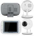 White 3.5 inch digital wireless baby monitor with UFO-style camera on a table.