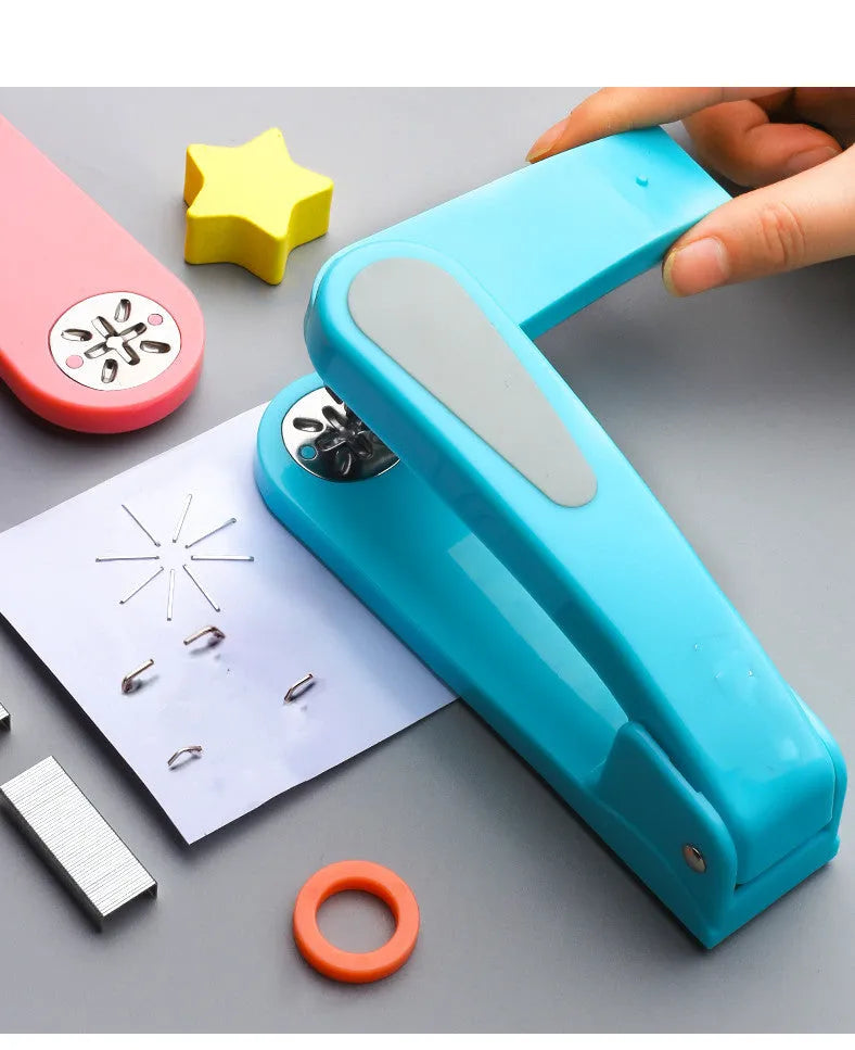 Rotatable student stapler with 360-degree spinning head in dark blue, showing staples loaded and metal outlet.