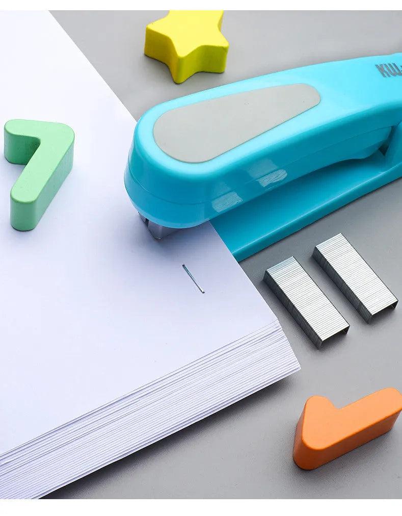 Rotatable student stapler with 360-degree spinning head in dark blue, showing staples loaded and metal outlet.