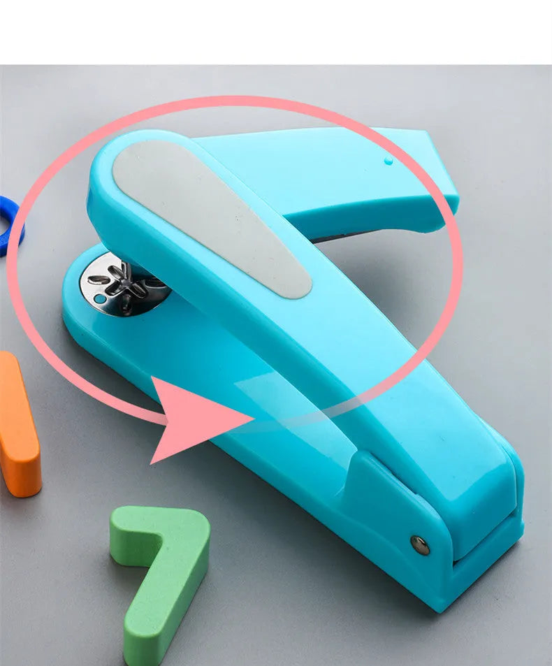 Rotatable student stapler with 360-degree spinning head in dark blue, showing staples loaded and metal outlet.