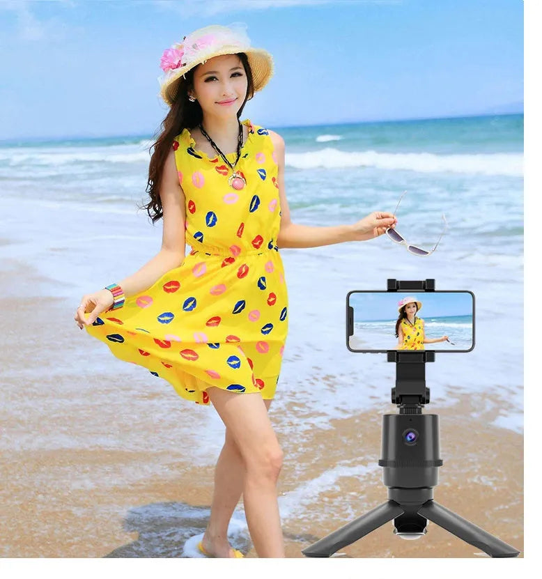 360-degree intelligent AI tracking pan-tilt bracket holding a smartphone for hands-free recording
