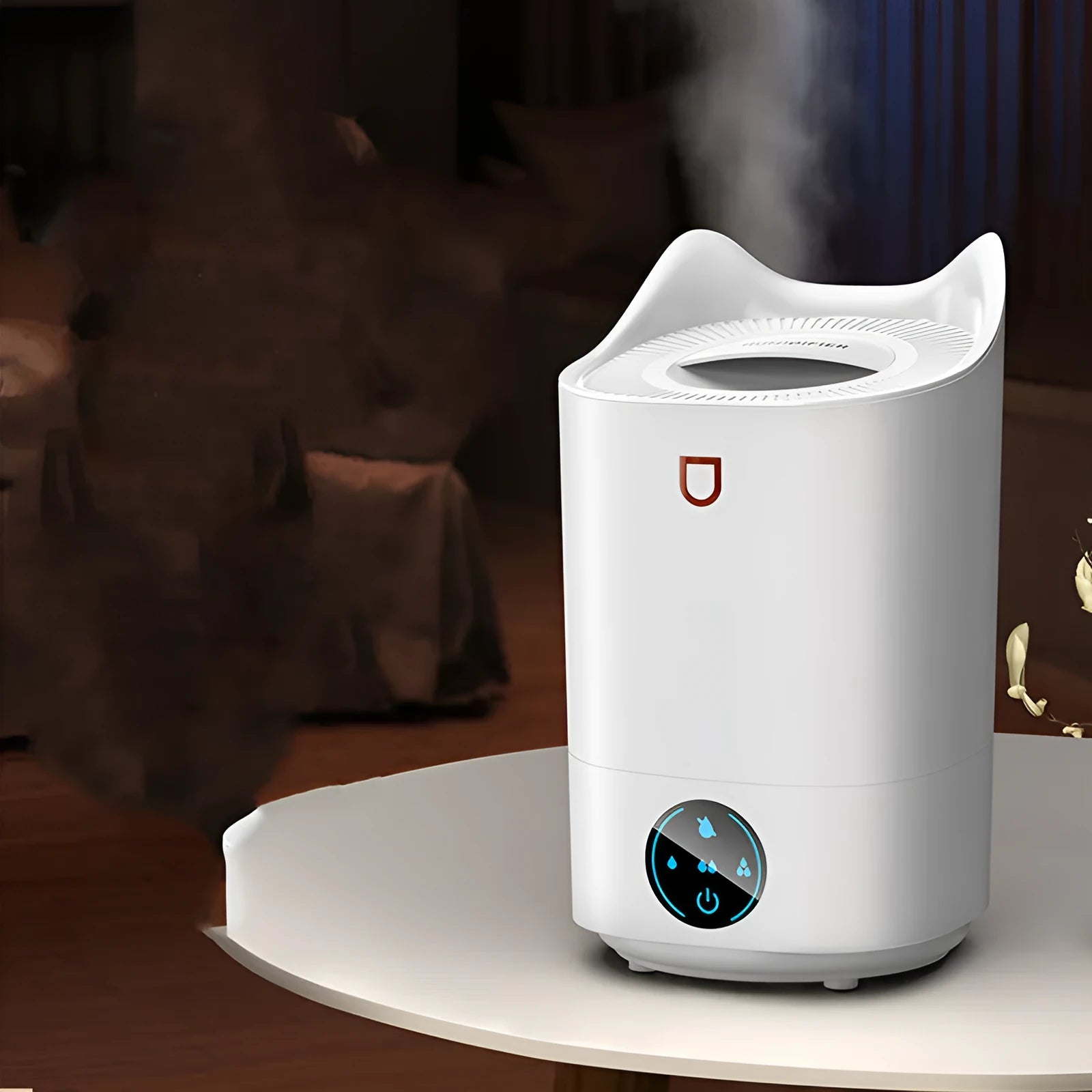 Double spray humidifier with large water tank in coral pink colour, showing three mist outlets