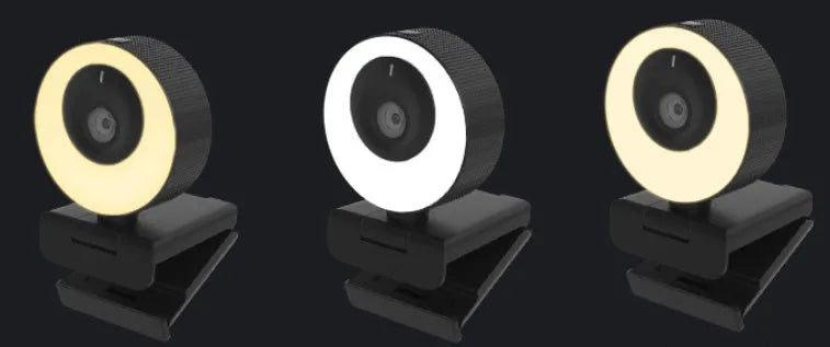 Black USB webcam with magnetic privacy cover on a laptop screen