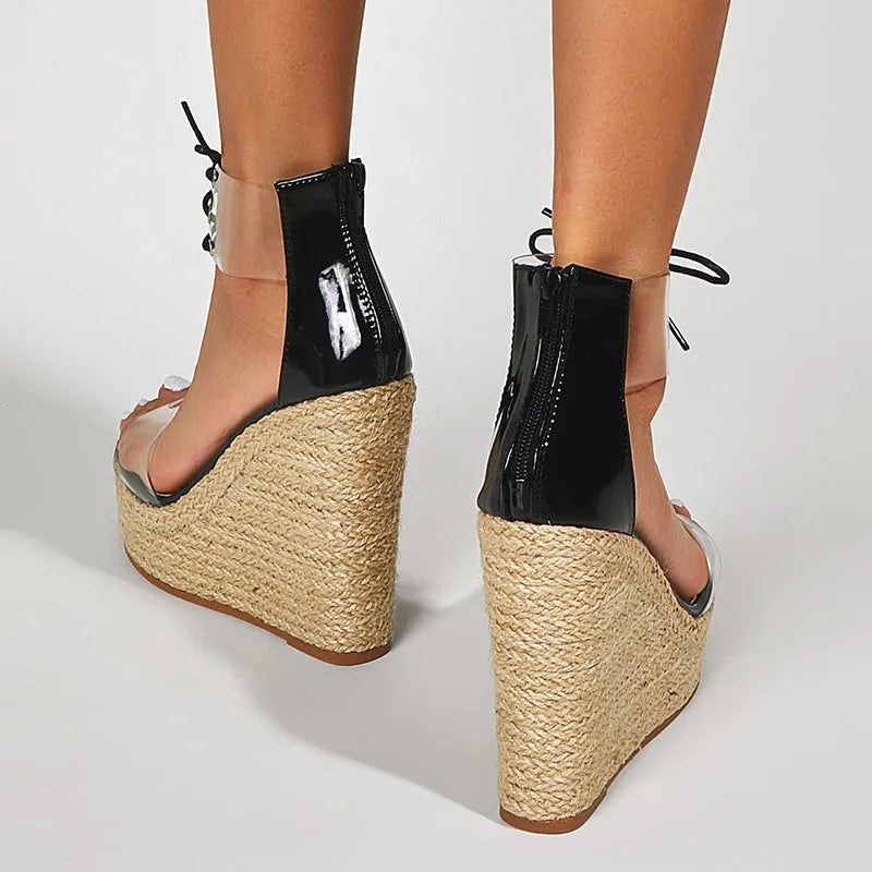 Black women's wedge sandals with hemp rope design, high 8cm platform heel, and adjustable front tie closure.