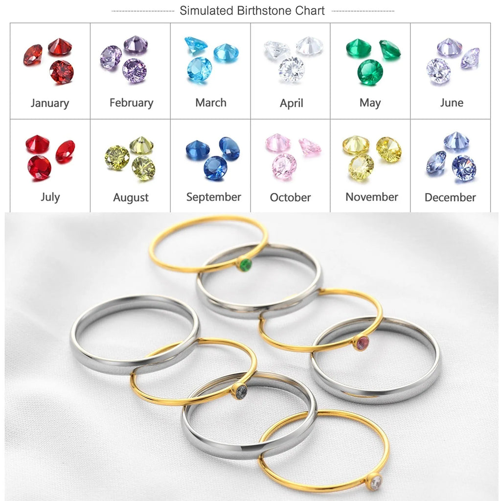 A geometric engraved titanium steel ring with a December birthstone, shown in UK ring sizes.