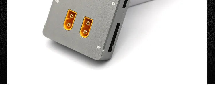 Grey parallel charging board for RC model and drone batteries.