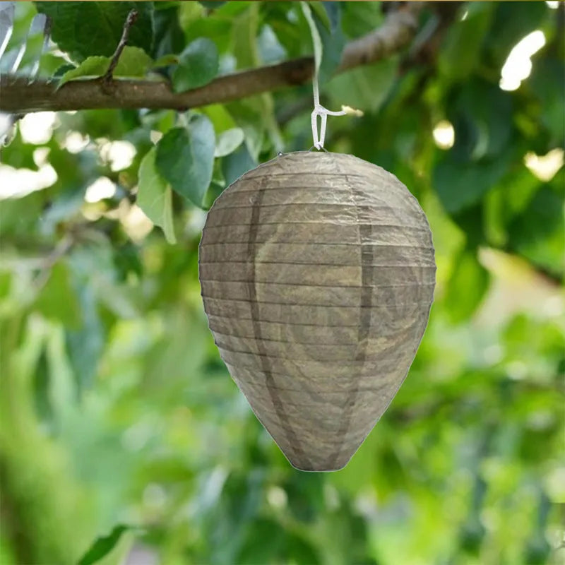 White honeycomb-shaped paper lantern with wire frame, shown against a neutral background.