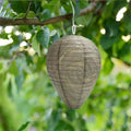 White honeycomb-shaped paper lantern with wire frame, shown against a neutral background.