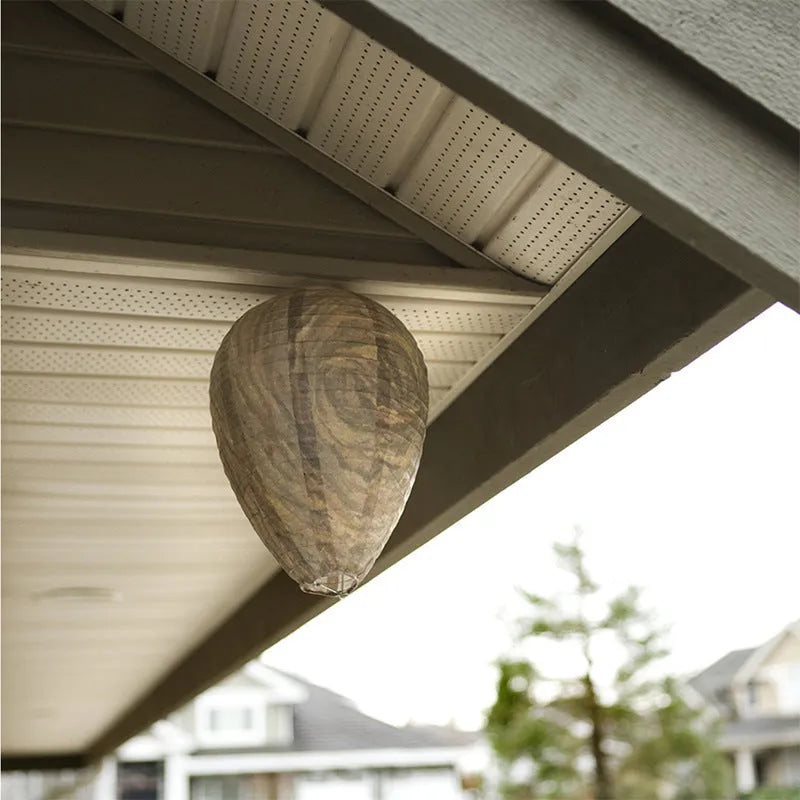 White honeycomb-shaped paper lantern with wire frame, shown against a neutral background.